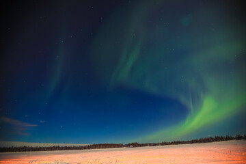northern lights on a full moon night, fairbanks, alaska