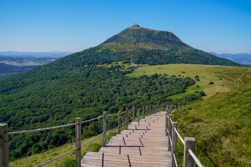 wooden walking path to access puy de dome french chain mountains volcano