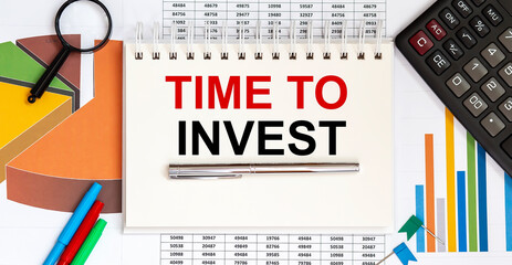 Poster - Notepad with text Time To Invest on business charts and pen and charts