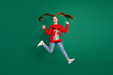 Canvas Print - Full length photo of crazy funky pretty cute lady jump high x-mas party greet friends event running door way hug wear reindeer red ugly ornament sweater jeans isolated green color background