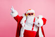 © deagreez - Photo of funky cool big abdomen santa claus enjoy listen headphones x-mas christmas songs radio raise fingers dance wear sunglass suspenders headwear isolated over pastel color background