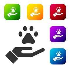 Poster - Black Hands with animals footprint icon isolated on white background. Pet paw in heart. Love to the animals. Set icons in color square buttons. Vector.