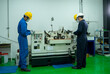 © visoot - Industrial worker wearing protective mask to Protect Against Covid-19 working and checking production process at factory,Industrial concept,Coronavirus has turned into a global emergency.