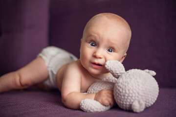 Cute little boy looking at the camera.
Beautiful smiling cute baby