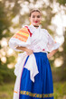 © muro - Slovak folklore. Girl in slovak folk dress.