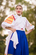 © muro - Slovak folklore. Girl in slovak folk dress.