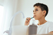 © kleberpicui - 10 year old boy brushing his teeth in the bathroom