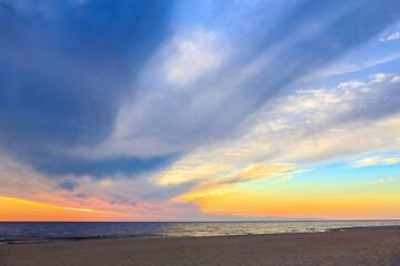 Canvas Print - Beautiful Cloudy Sky at Dawn over the Sea