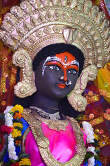 Wall Mural - Closeup of face of Goddess Durga, Idol of goddess Durga, hindu festival navratri.