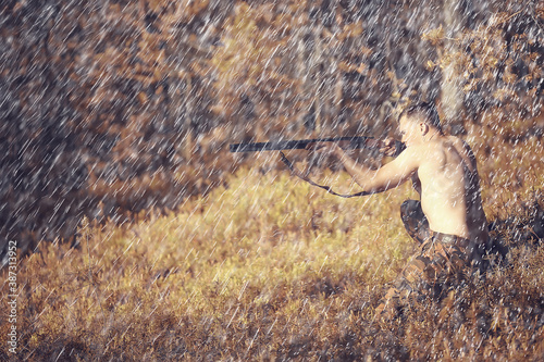 Cuadros en Lienzo man goes hunting forest summer / landscape in the forest, huntsman with a huntin