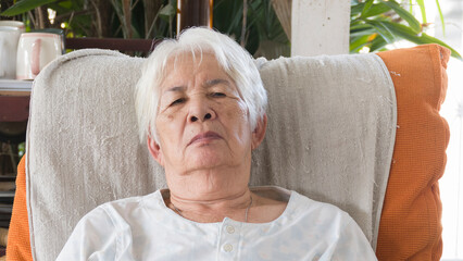 Senior asian women Sleeping in the house alone.