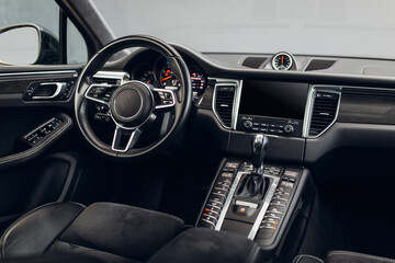 Poster - Modern suv car interior with the leather panel, multimedia, and dashboard