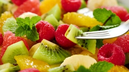 Canvas Print - eating fresh fruit salad