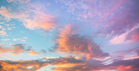 Beautiful colorful bright sunset sky with orange clouds. Nature sky background.


