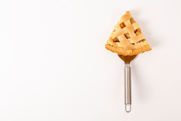 Wall Mural - Traditional American Thanks Giving lattice pie isolated on white background. Homemade fruit tart baked to golden crust. Close up, copy space, top view.