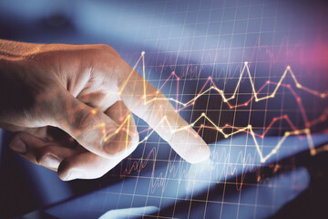 Multi exposure of man's hands holding and using a phone and financial chart drawing. Market analysis concept.