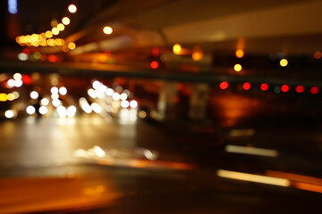 Abstract Car traffic at night. Motion blurred. Which urban city beautiful background.