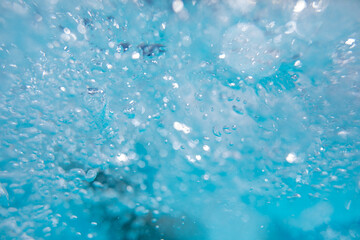 Beautiful water waves -  Splashed water wave in clean blue water, clean filtered water ready for drinking