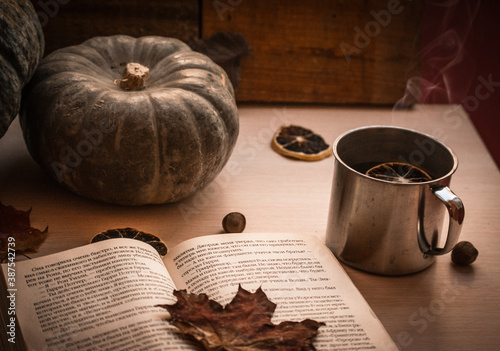 In autumn it\'s nice to read a good book and drink tea