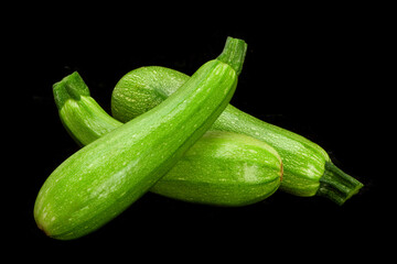 Wall Mural - Zuccini vegetable on black