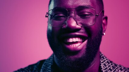 Wall Mural - African american man laughing in studio. Natural male person smiling indoors