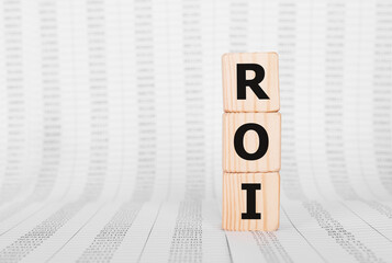 Wall Mural - Word ROI made with wood building blocks