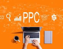 PPC - Pay Per Click Concept With Person Using A Laptop Computer