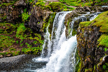 Grundarfjordur, Iceland Kirkjufell Waterfall Closeup On Snaefellsnes Peninsula With Lush Green Grass In Summer