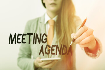 Fototapete - Word writing text Meeting Agenda. Business photo showcasing items that participants hope to accomplish at a meeting Model displaying different shots of holding pen ready for promotional use