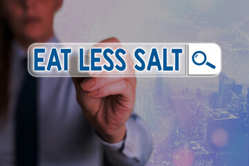 Wall Mural - Conceptual hand writing showing Eat Less Salt. Concept meaning reducing the sodium intake on the food and beverages Web search digital futuristic technology network connection