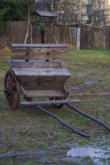 an old two-wheeled cart on a village street