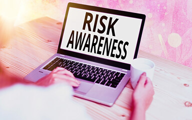 Sticker - Text sign showing Risk Awareness. Business photo showcasing recognizing factors that may cause a lifethreatening effect Modern gadgets with white display screen under colorful bokeh background