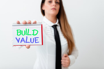 Poster - Text sign showing Build Value. Business photo text efficient enough way that it will generate profit after cost Model displaying different empty color notepad mock-up for writing idea