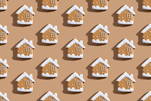 Christmas Bakery Pattern. Festive Food Decor. Homemade Cookies. Gingerbread Biscuit House Figures With White Icing Isolated On Beige Background.