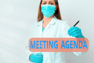 Fototapete - Writing note showing Meeting Agenda. Business concept for items that participants hope to accomplish at a meeting Laboratory technician featuring empty paper accessories smartphone