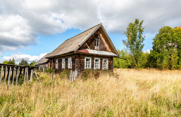 Wall Mural - Old rural wooden house in abandoned russian village