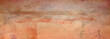 Abstract vintage orange background pattern with texture and painted old grunge stains