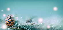 Winter Christmas Background With Magic Lights, Pine Cone In Snow Landscape