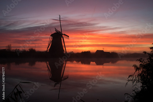 windmills at sunset