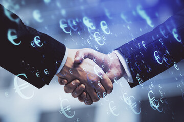 Double exposure of forex graph hologram and handshake of two men. Stock market concept.