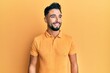 © Krakenimages.com - Young man with beard wearing casual clothes looking to side, relax profile pose with natural face and confident smile.