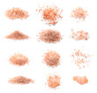 Piles of pink himalayan salt on white background