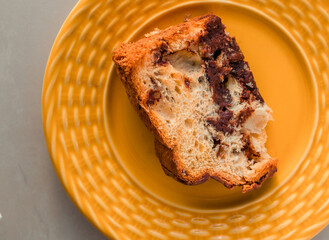 Wall Mural - Traditional Christmas panettone (Chocottone) on yellow plate