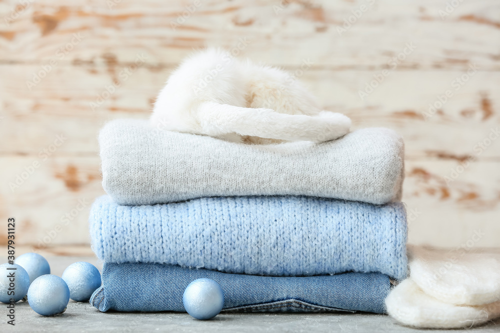 Stylish Christmas clothes on table