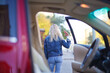 © AKaltykova - beautiful girl near red car, businesswoman