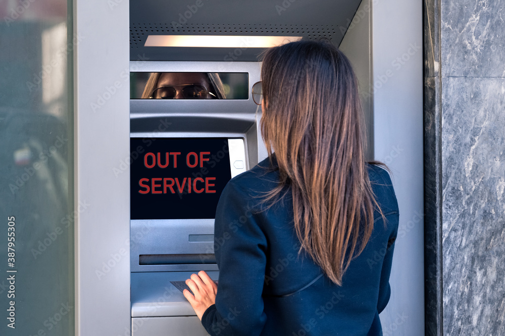 Lady can't withdraw cash money from credit card at bank machine. ATM is ...