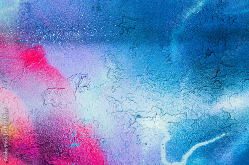 Photo A fragment of colorful graffiti painted on a concrete wall