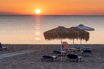 Wall Mural - beautiful sunrise over a sandy beach in rhodes