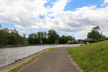 Erie Canal At Medina, New York. Tow Path Hiking Path Along The Canal.