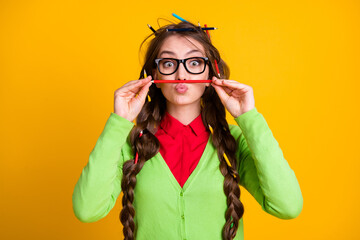 Canvas Print - Photo of geek girl messy haircut put pencil nose lips isolated yellow color background